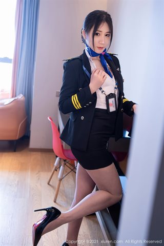 [XiuRen] No.3839 Big Mi Fan Gu Qiaonan Cora Capitán Yujie tema uniforme senos medio expuestos y nalgas gordas foto de tentación - 0017.jpg
