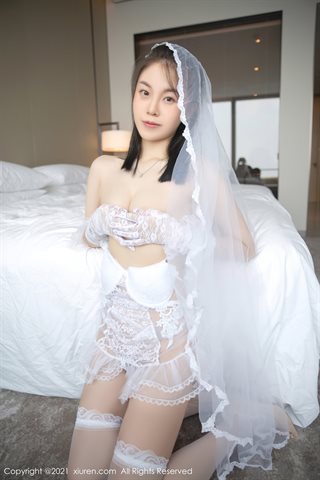 [XiuRen] No.4119 Modèle un jaune d'oeuf doux une chambre privée belle robe de mariée blanche spectacle vaporeux corps chaud - 0043.jpg